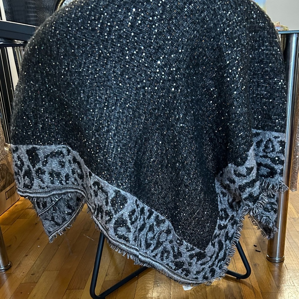 NWT INC wrap in black and grey Trimmed with animal print and fringe .